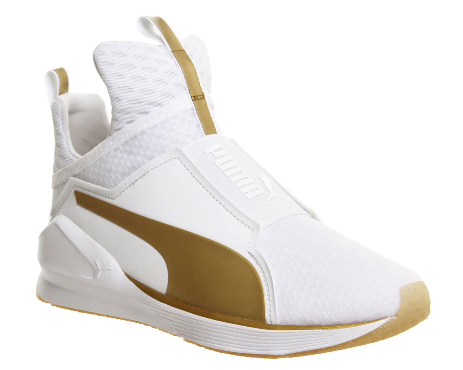 white and gold puma trainers