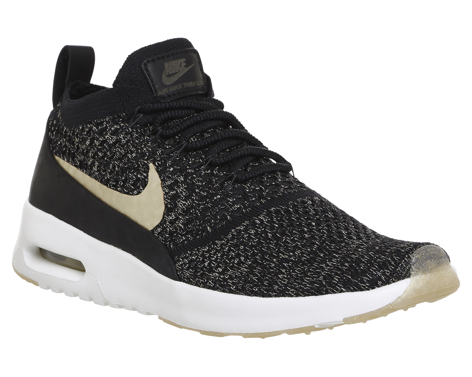 nike air max thea trainers in black and gold